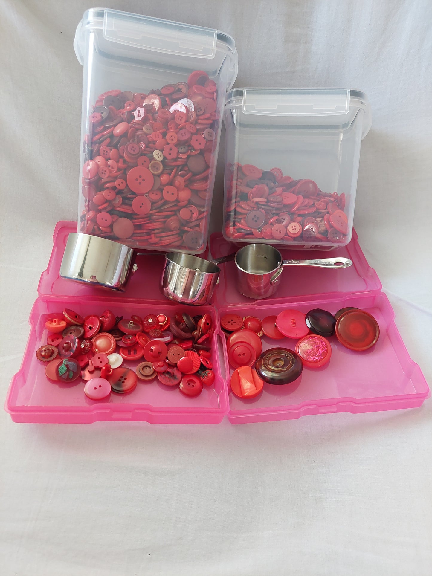 Single color- Red. Includes/ Unique/ Uncommon buttons.